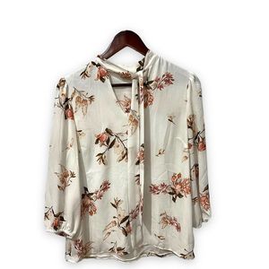 Reitmans white with floral print long sleeve button up v neck size medium